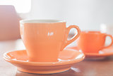 Orange coffee cup and mini orange coffee cup