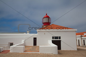 Lighthouse of Cabo de Sao Vicente in the morning mist, Sagres,Al