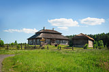 Beautiful restored old style russian farmhouse with thatch roof