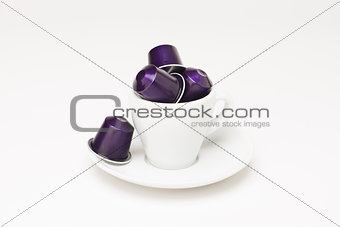 Coffee cup with capsule