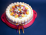 Cheesecake decorated with fig and kumquat