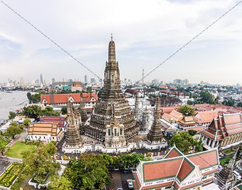 Wat Arun Temple and Chao Phraya Riverside in Bangkok Thailand.