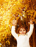 Autumn game of little girl