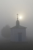 Orthodox chapel misty autumn morning.