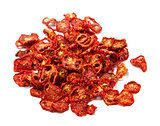 Dried slices of tomato on white background