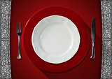 Empty Plate on Red Velvet Background