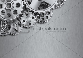 Steel gear wheels on metal background