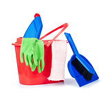 detergent bottles, brushes, gloves and sponges in bucket isolate