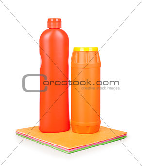 Detergents and colorful cloth on an isolated white background