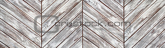grungy bleached wooden planks in the parquet order
