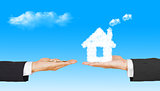 business Hands with money and house from clouds on blue sky back