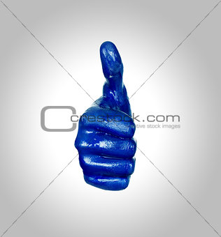 Image of human hand in blue paint Like