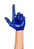 hand with a raised index finger, painted in blue paint isolated 