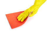 human hand with rubber glove wiping with a cloth