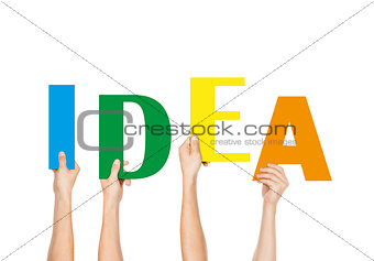 People Holding the Colorful Word Idea, Isolated