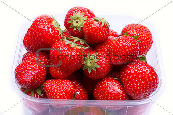 Strawberries in a container for sale