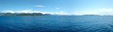 Sea summer coastline view from ferry (Greece). Panorama.