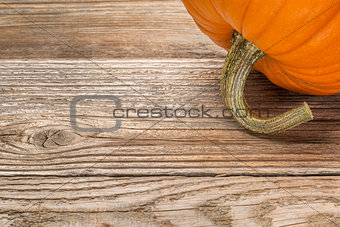 weathered wood with pumpkin