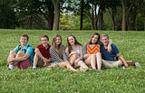 Teen Students Sitting Outdoors