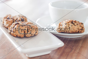 Coffee cup and mixed nut cookies