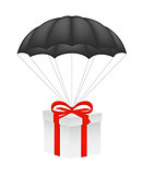 Gift box at black parachute