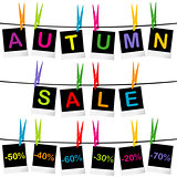 Autumn sale concept with photo frames hanging on clothespins