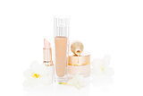 Beige feminine make up and cosmetic products.