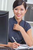 Asian Chinese Woman or Businesswoman in Office