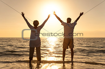 Senior Man & Woman Couple Sunset on Beach