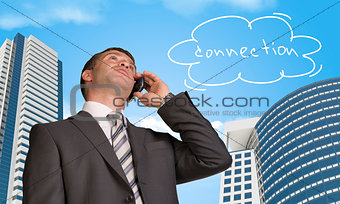 Businessman talking on the phone. Cloud with word connection