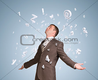 Businessman spread his arms. Figures and letters fall from above
