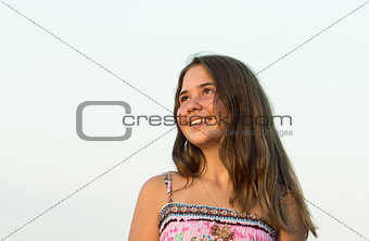 Outdoor portrait of the girl of 14 years old.