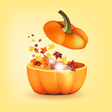 Pumpkin with autumn leaves