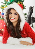 Smiling lady in Santa Claus outfit