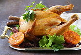 baked chicken with oranges and herbs for festive dinner