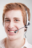Call center red head smiling boy