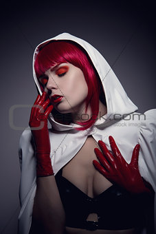 Mysterious sensual vampire girl with red lips   