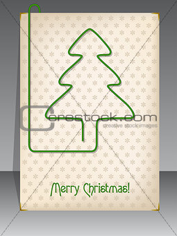 Christmas card with christmas tree shaped paper clip