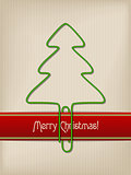 Striped christmas greeting with tree shaped paper clip