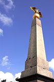 Obelisk with a golden double-headed eagle