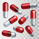 Set of red and transparent medical capsules in different positions