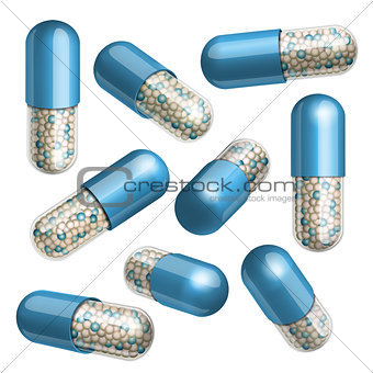 Medical blue  capsule with granules in different positions.