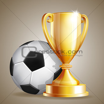 Gold cup with a football ball.