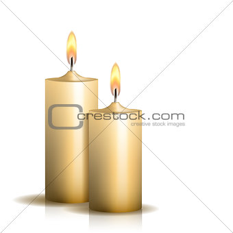 Two burning candles on white background.