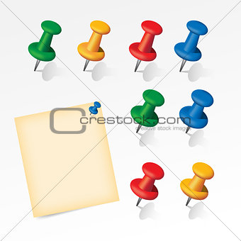 Colorful pins set with paper note