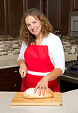 woman cutting bread