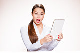 Attractive young woman with tablet.