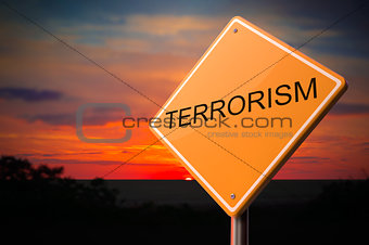 Terrorism Inscription on Warning Road Sign.