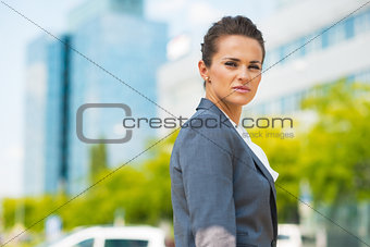 Portrait of confident business woman in office district
