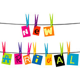 New arrival message with colored pieces of paper hanging o a rop